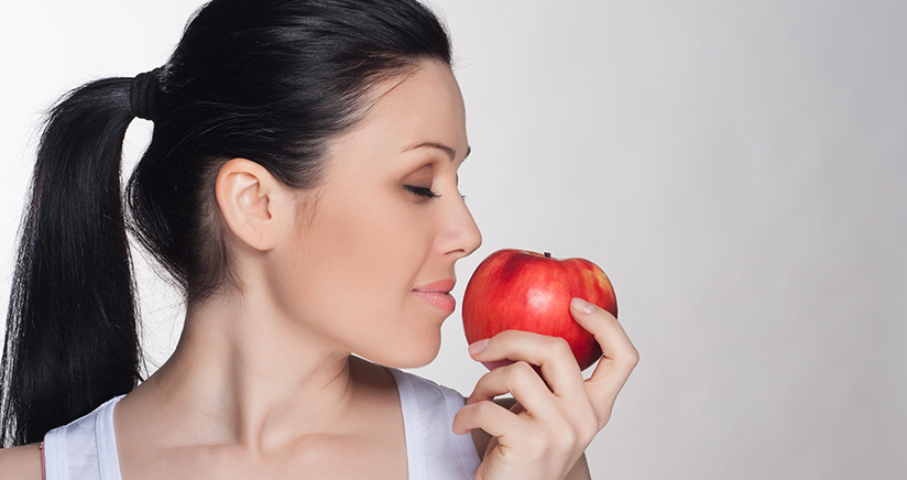 Woman Eating an Apple